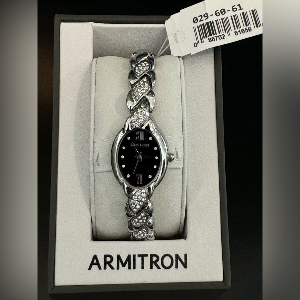 Brand new silver watch with faux diamonds